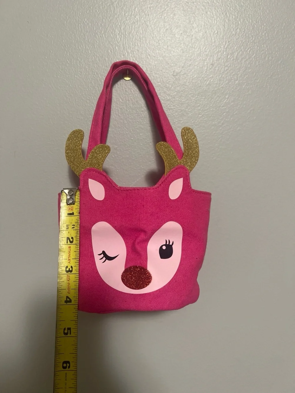 Pink reindeer gift bag